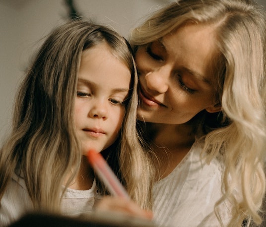 Mother smiling at child