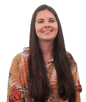 Meet Our Experienced Therapy Team in Brooklyn, Heights, NY Andrea Fetterly, a woman smiling and ready to help in a therapy office